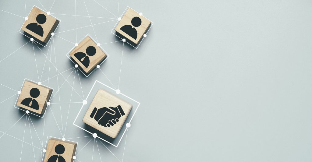 Top view design of wooden cube block connection with human icon for DAOs Example concept.